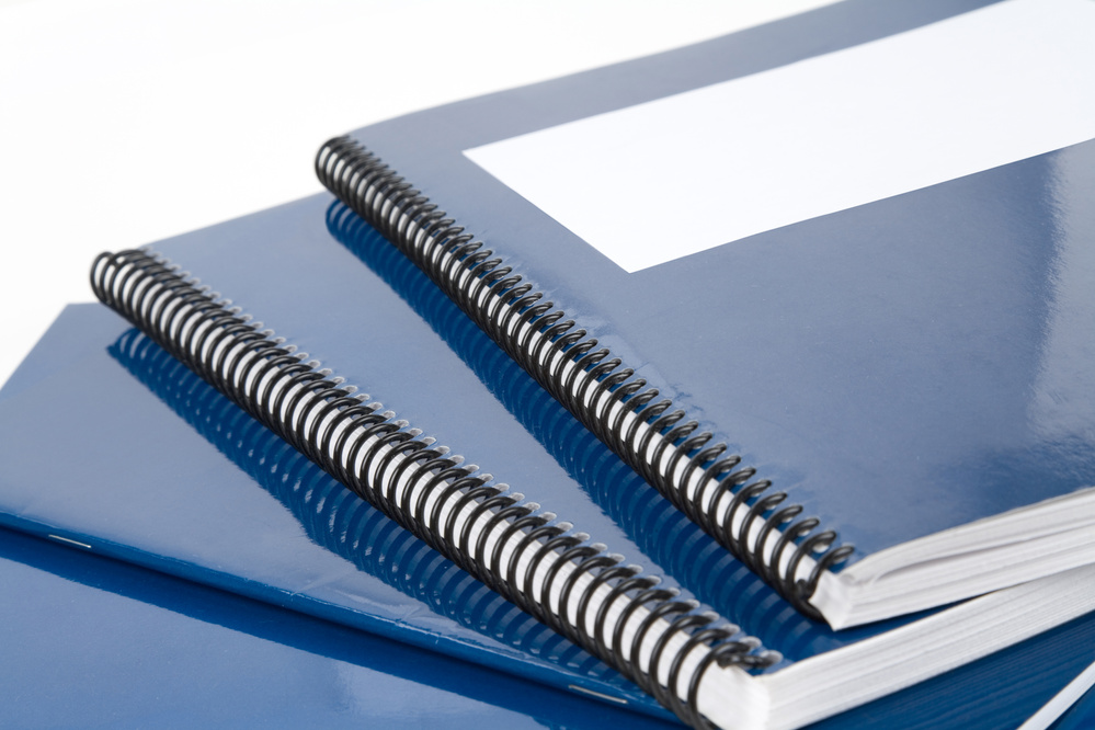 Blue school notebooks and workbooks